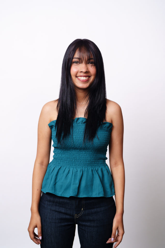 Clip-in Korean hair bangs in natural black color on Indian woman - front view showing seamless hairline blend