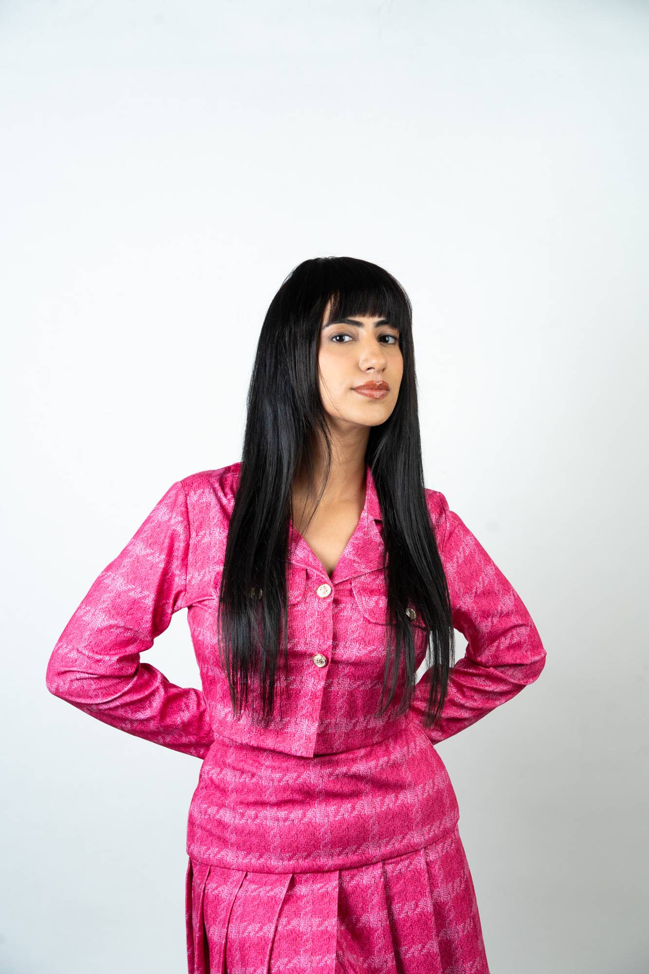 Model Wearing Dolcy Deepika Padukone Style Clip-In Bangs in Jet Black – Front Lifestyle View Showing Sleek Straight Fringe and Full-Length Glossy Hair