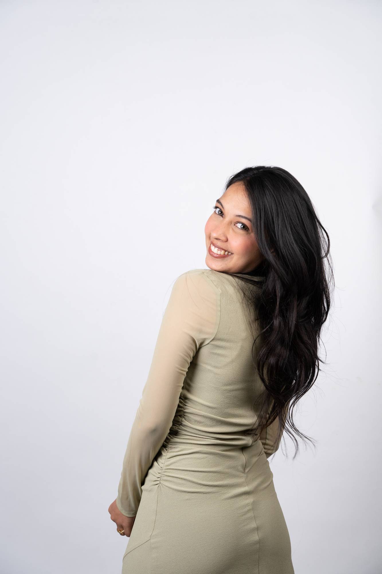 Model Wearing Dolcy 2 Clip Invisible Hair Patch in Jet Black – Back Angled View Showing Natural Volume and Seamless Blend of Patch with Natural Wavy Hair