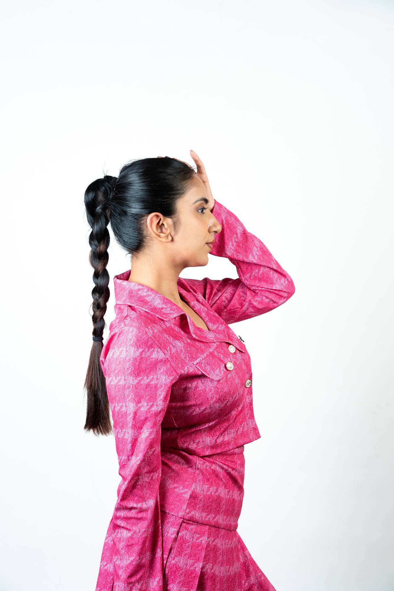 Side Profile of Model Wearing Dolcy Braid Ponytail Hair Extension in Dark Brown – Showing Crown Placement, Full Braid Length, Natural Root Blend, and Sleek Finish