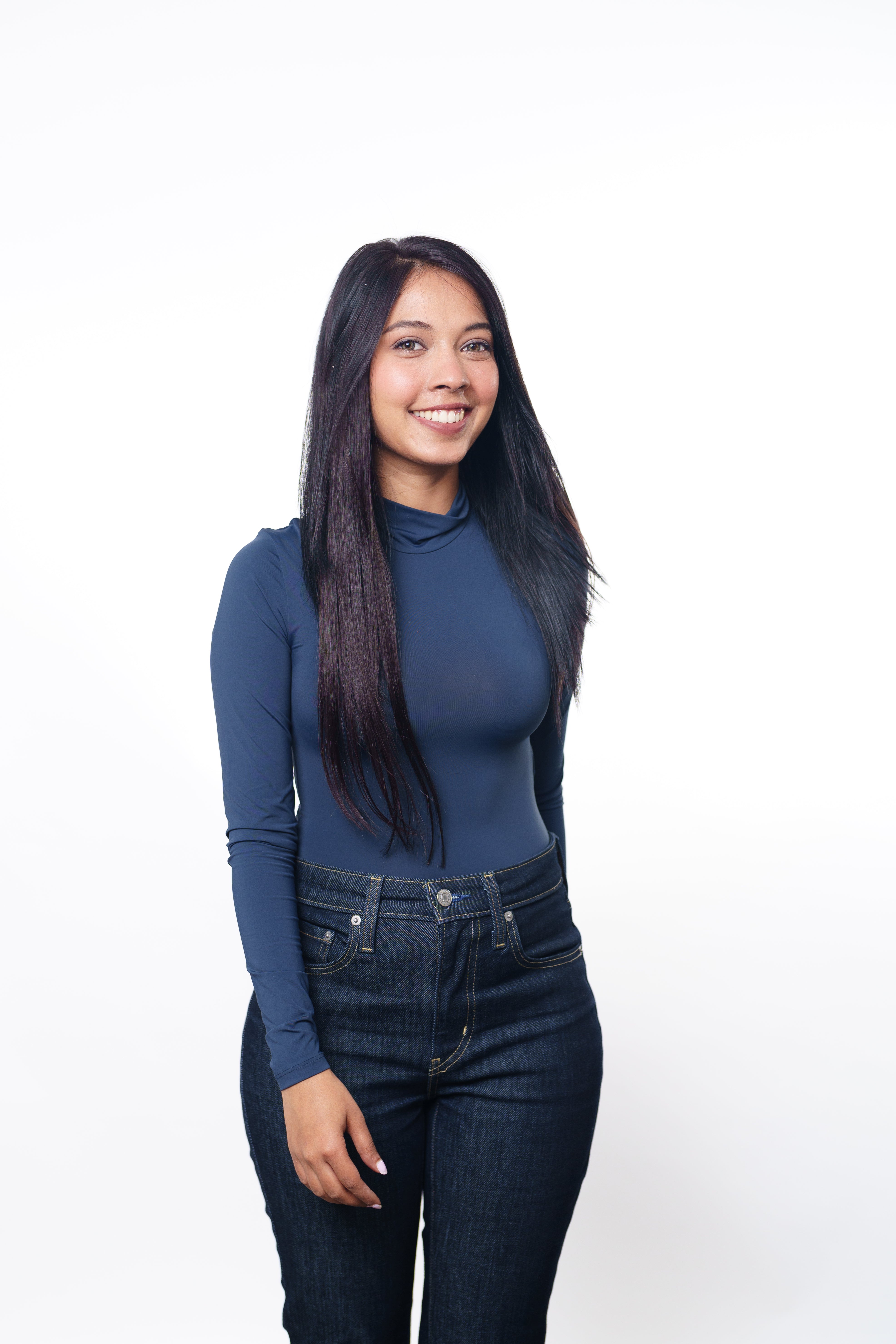 Model Wearing Dolcy Classic 2 Set Clip-In Wavy Hair Extension in Jet Black – Front Angled Lifestyle View Showing Natural Volume and Length