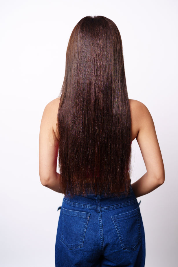 Back View of Model Wearing Dolcy Classic 7 Set Clip-In Straight Hair Extension in Dark Brown – Seamless Blend with Natural Hair