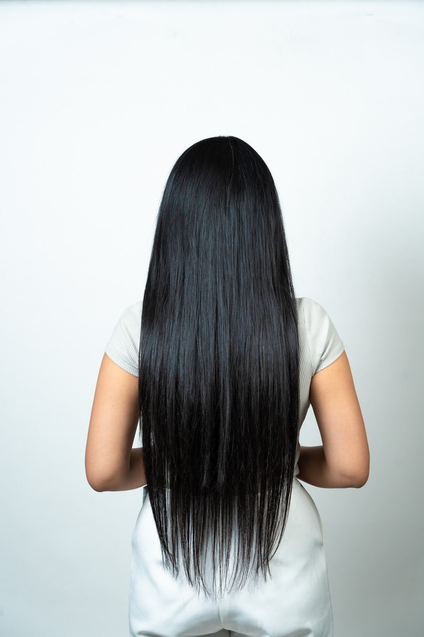 Back View of Dolcy Halo Straight Hair Extension in Jet Black – Showing Full Back Coverage, Ultra-Long Length, and High-Shine Silky Finish