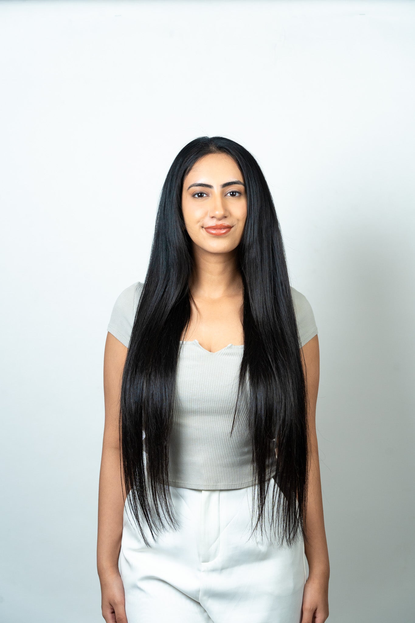 Model Wearing Dolcy Halo Straight Hair Extension in Jet Black – Front View Showing Ultra-Long Full Length and Silky Smooth Shine